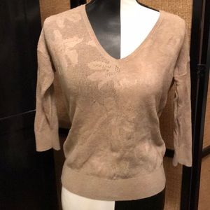 Tan cotton sweater with flower patterns